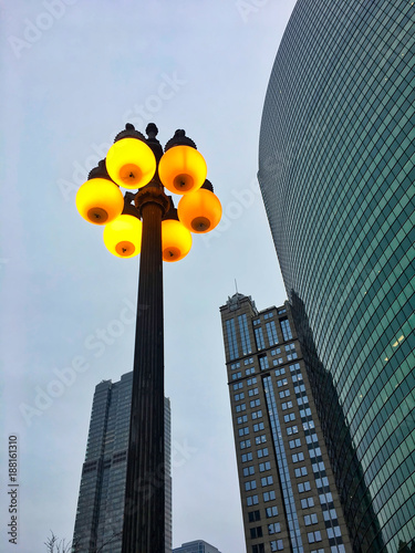 Wallpaper Mural View from below illuminated light bulbs on a street lamp in Chicago. Torontodigital.ca