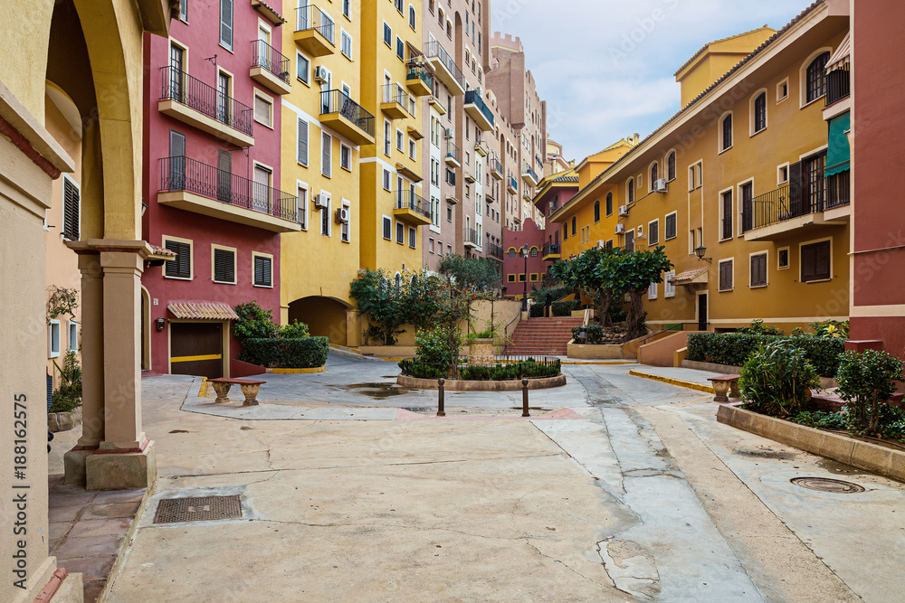 Naklejka premium City street with colorful houses.