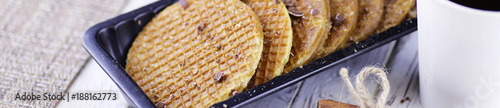 Horizontal panorama bakground of viennese wafers with caramel