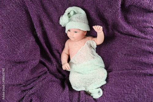 Cute newborn baby lying on ...