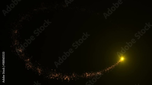 Flying comet with a tail of glittering star dust particles on a black background. 4K video for overlay in the blending mode of Screen. CGI animation of space comet.