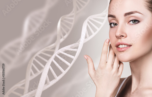 Portrait of sensual woman among DNA chains