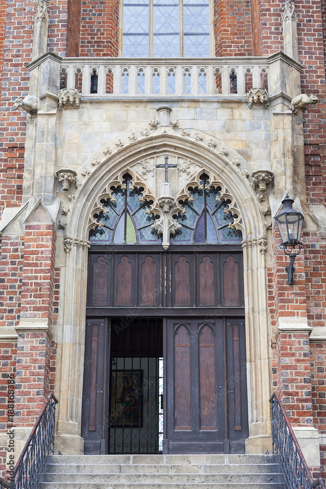 Obraz premium Collegiate Church of the Holy Cross and St. Bartholomew,an entrance gate, Ostow Tumski, Wroclaw, Poland
