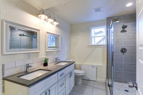 White bathroom vanity with granite top