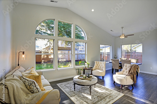 Sun filled family room in soft beige tones.