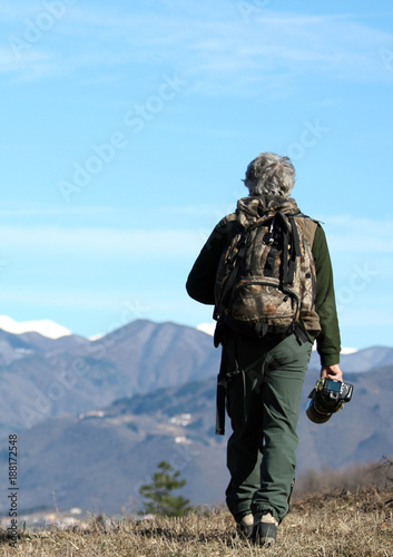 Man walking over the mountains