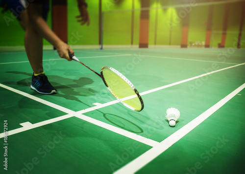 badminton court with players playing