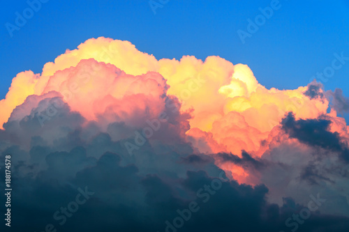 blue sky and cumulus clouds at sunset