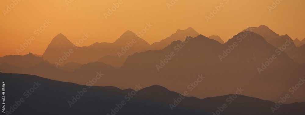Obraz premium Golden sunrise near Gstaad. Summer morning in the Swiss Alps.