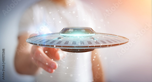 Fototapeta Naklejka Na Ścianę i Meble -  Businessman with retro UFO spaceship 3D rendering