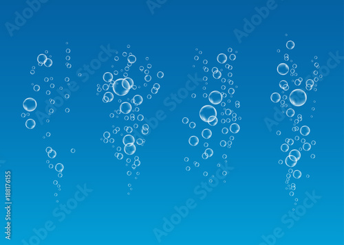  Underwater fizzing air bubbles flow on blue background.