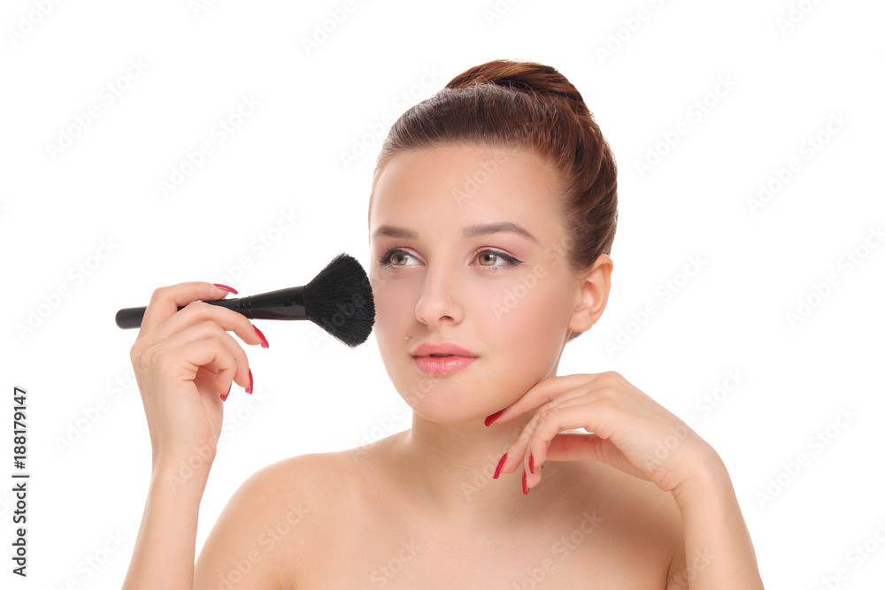 woman applying dry cosmetic powder woman applying dry cosmetic powder
