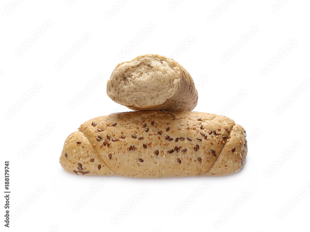 Whole wheat bread roll slices with sesame and linseed isolated on white background Whole wheat bread roll slices with sesame and linseed isolated on white background