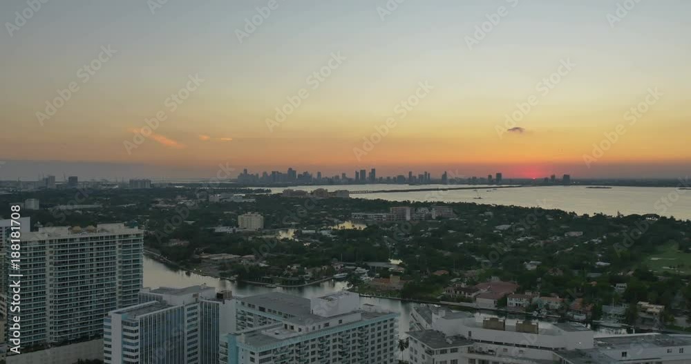 Miami,Florida,USA - November 2014: Aerial view over Miami skyline at sunset Miami,Florida,USA - November 2014: Aerial view over Miami skyline at sunset