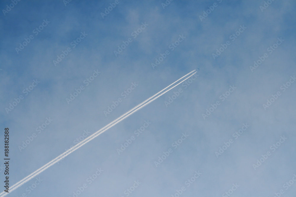 flying in the sky plane, leaving behind two bands. flying in the sky plane, leaving behind two bands.