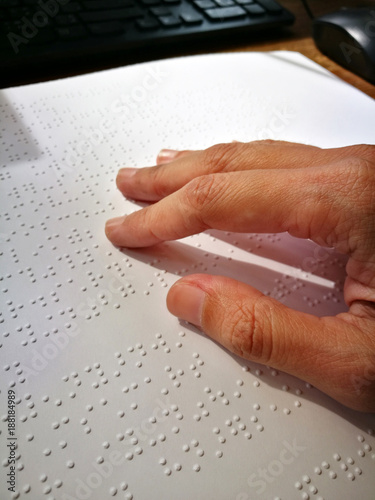 Blind Woman Read Book Written In Braille. Close Up Finger Touch To Braille Code