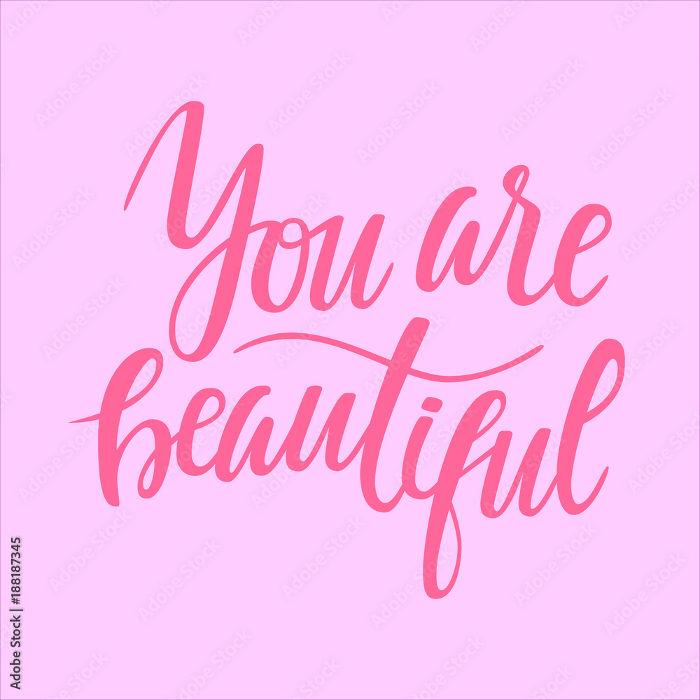 You are beautiful. Hand lettering drawing on the pink background on the theme of Valentine's Day.  illustration