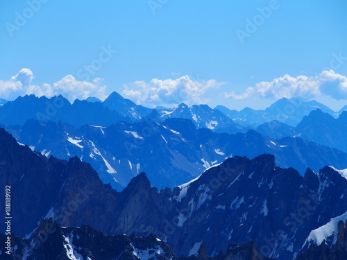 Alpine mountains range landscape in French ALPS seen from Aiguille du Midi at CHAMONIX MONT BLANC in FRANCE