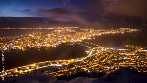 Aerial view of a winter storm approaching the city Tromso, Norway