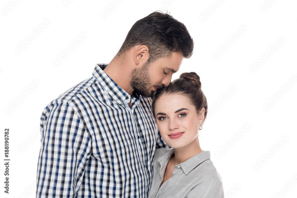 boyfriend kissing girlfriend isolated on white boyfriend kissing girlfriend isolated on white
