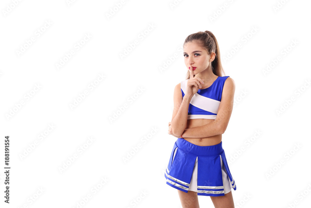 Young cheerleader in blue and white suit on white background. Isolated on white background. Young cheerleader in blue and white suit on white background. Isolated on white background.