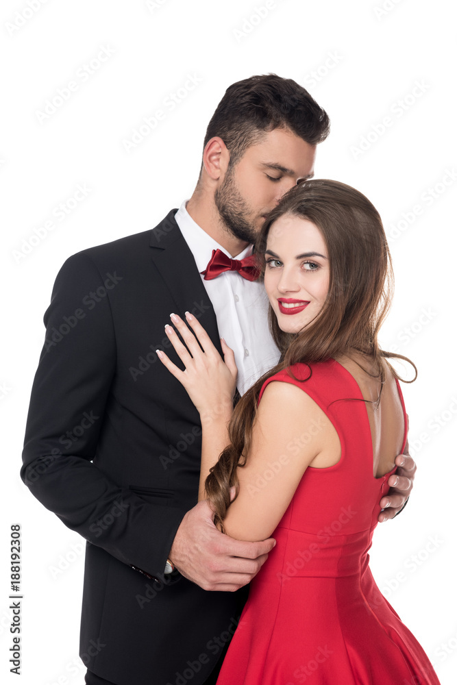boyfriend kissing girlfriend isolated on white