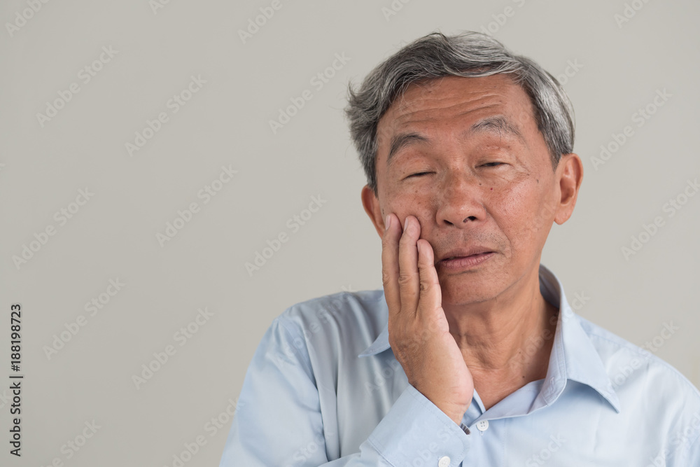 sick old senior man with toothache, dental care concept