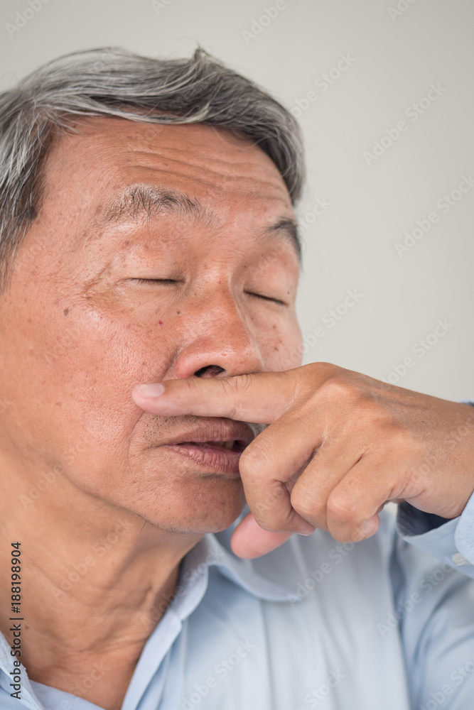 sick old senior man, flu, cold, runny nose sick old senior man, flu, cold, runny nose