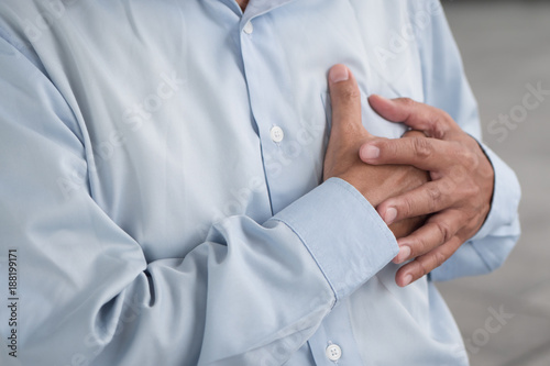 senior old man heart attack, hand holding chest