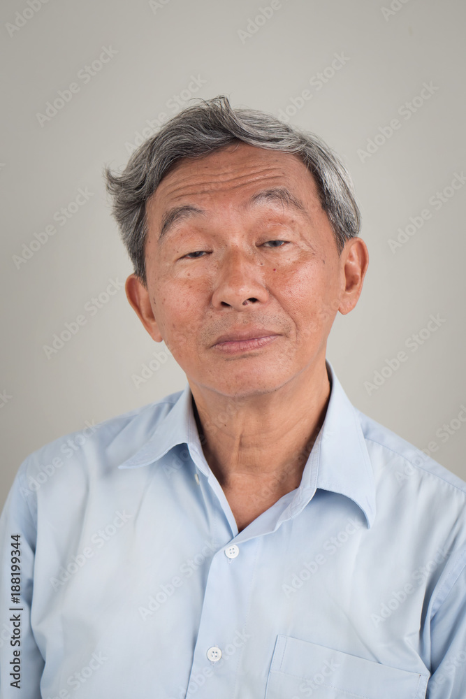 portrait of retired senior old man, neutral expression portrait of retired senior old man, neutral expression