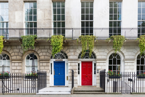Town house with red and blue door, London, UK