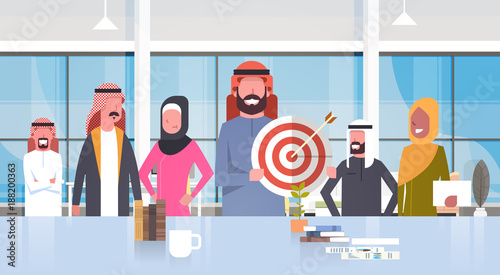 Group Of Arabic Business People In Modern Office Businessman Hold Target Aim Muslim Team Wearing Traditional Clothes Flat Vector Illustration