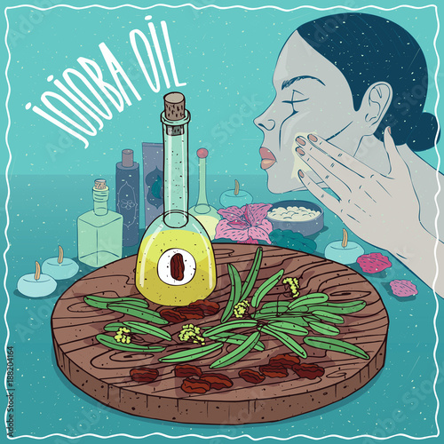 Glass Decanter of Jojoba oil and seeds of Simmondsia chinensis plant. Girl applying facial mask on face. Natural vegetable oil used for skin care