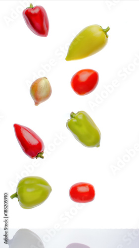 Wallpaper Mural Flying vegetables on an white background. (levitation concept) Torontodigital.ca