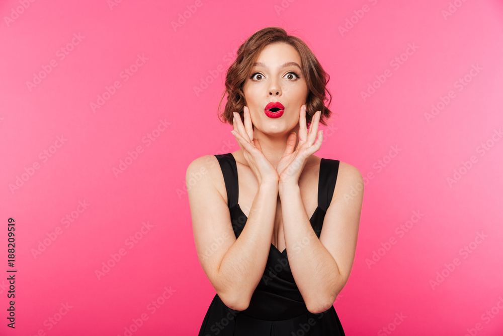 Portrait of a pretty girl dressed in black dress shouting Portrait of a pretty girl dressed in black dress shouting