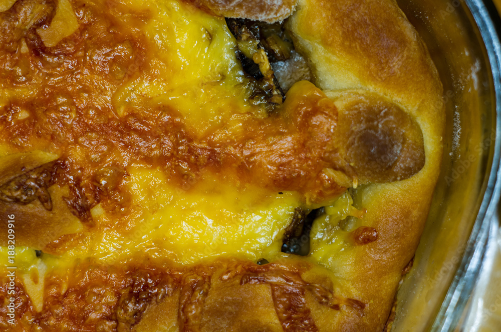 baked In the oven homemade pie stuffed with cheese and mushrooms baked In the oven homemade pie stuffed with cheese and mushrooms