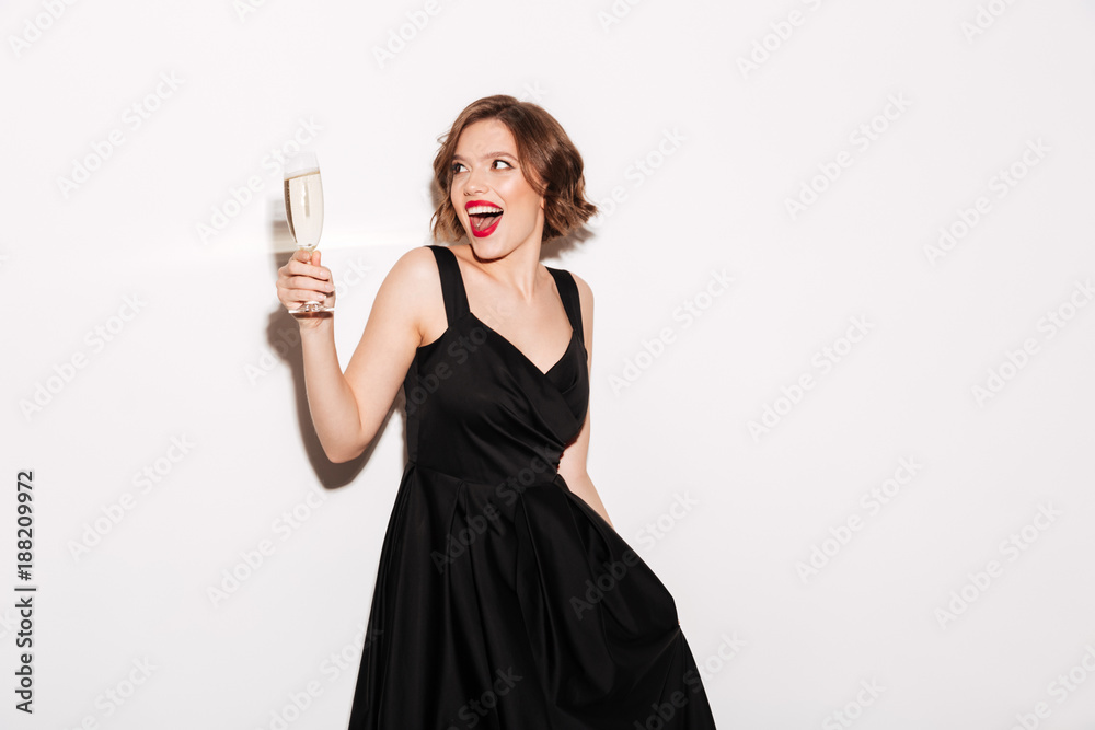 Portrait of a cheery girl dressed in black dress Portrait of a cheery girl dressed in black dress