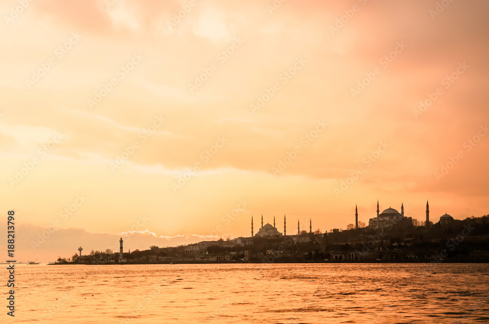Istanbul city view with Blue mosque from Bosphorus strait at Sunset