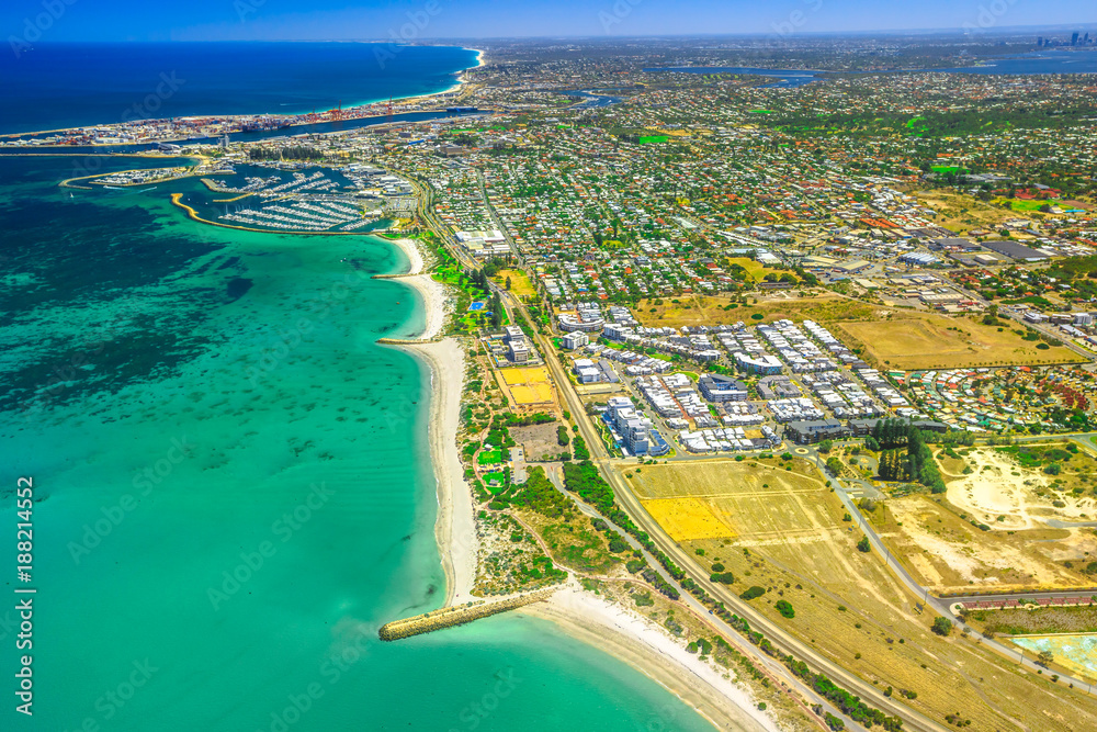 Aerial view of Fremantle Harbour, near Perth, the Western Australia's largest and busiest general cargo port. Scenic flight over Fishing Boat Harbour and South Beach, Australia.