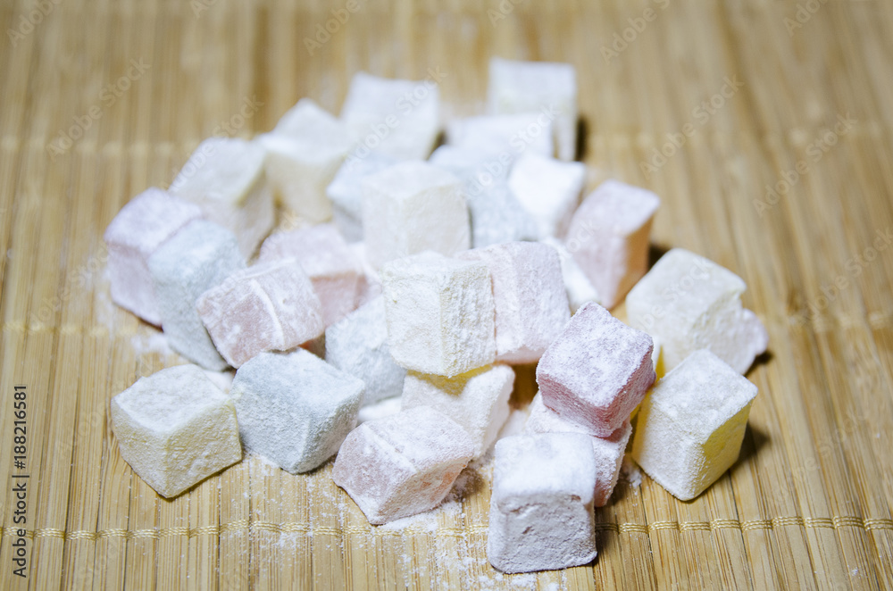 Turkish Delight in powdered sugar. Close-up, selective focus.