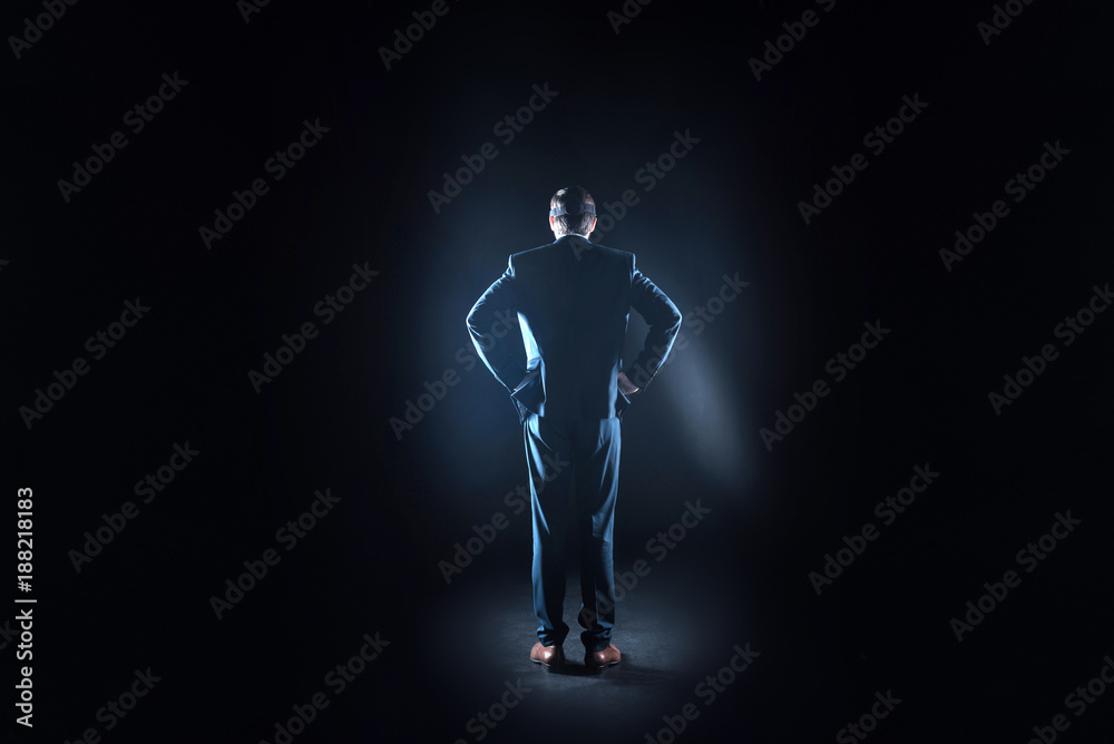 Obraz premium VR concept. Nice pleasant handsome man standing and turning his back to you while being in virtual reality