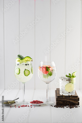 Obraz na płótnie fancy gin and tonic selection drink alcohol cocktail craft fresh fruit spices mint glass bar w salonie