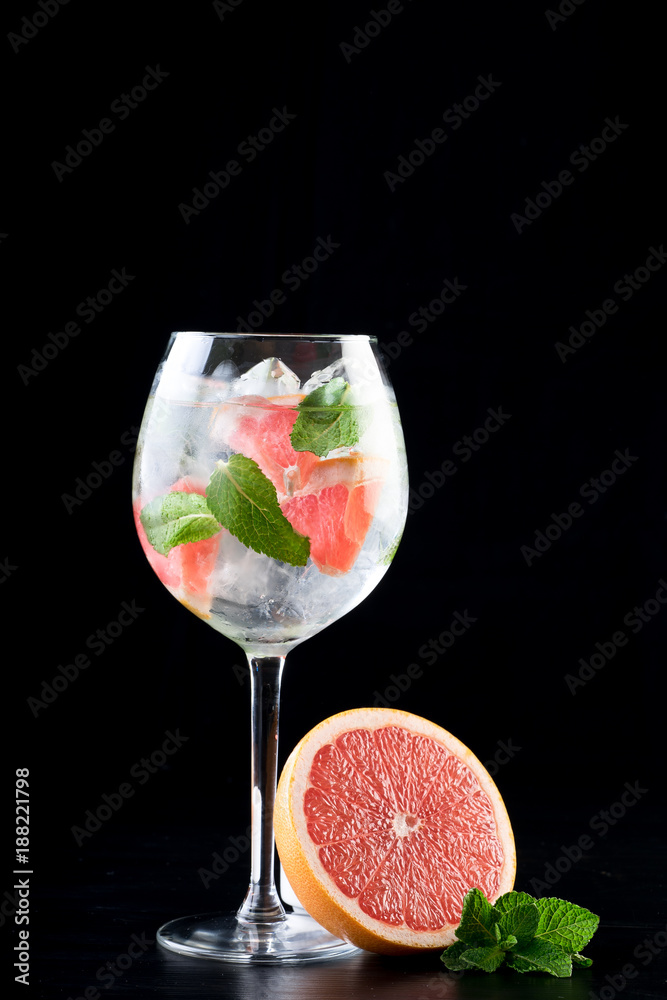 fancy gin and tonic selection drink alcohol cocktail craft fresh fruit spices mint glass bar