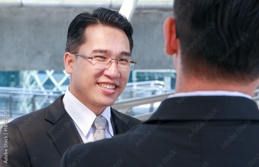 smile of businessman with blur partnership concept smile of businessman with blur partnership concept
