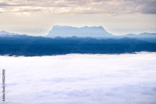 Fototapeta Naklejka Na Ścianę i Meble -  Winter sunrise in mountains. Fog in mountains. Fantasy and nature landscape. Nature conceptual image.