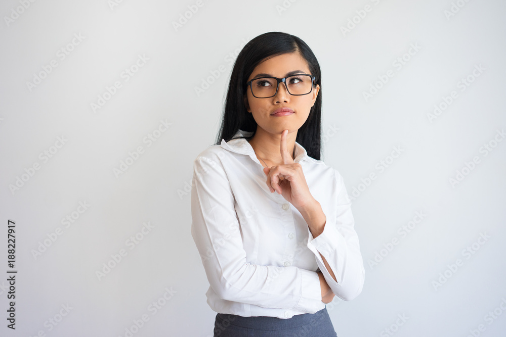 Pensive Nice Young Business Lady Touching Chin Pensive Nice Young Business Lady Touching Chin