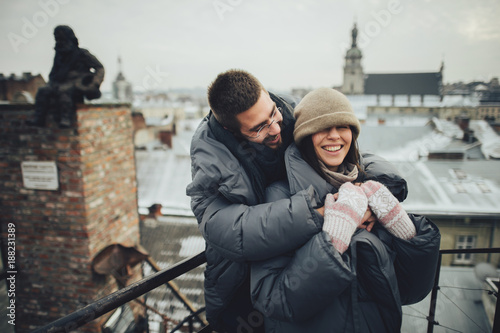 Couple has fun and laughs. kiss. Young hipster couple hugging ea  © VAKSMANV