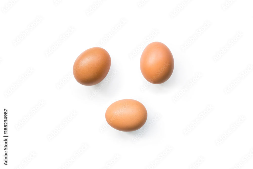 fresh brown organic chicken eggs isolated on white background. Horizontal composition. Top view