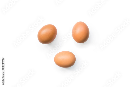 fresh brown organic chicken eggs isolated on white background. Horizontal composition. Top view