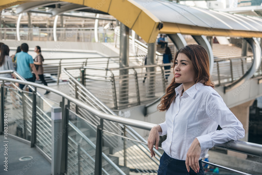 Portraits of beautiful asian woman look cheerful and confidence is standing and feeling success with work. Portraits of beautiful asian woman look cheerful and confidence is standing and feeling success with work.